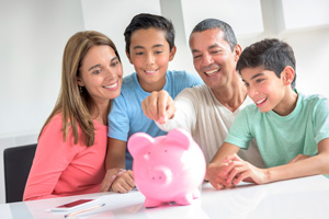 family giving their kids a personal financial education