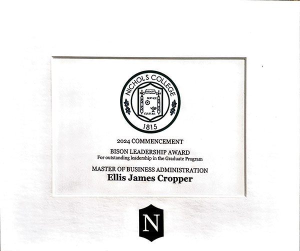 Bison Leadership Award 600w Nichols College awarded Ellis Cropper the Bison Leadership Award for outstanding leadership in the graduate program