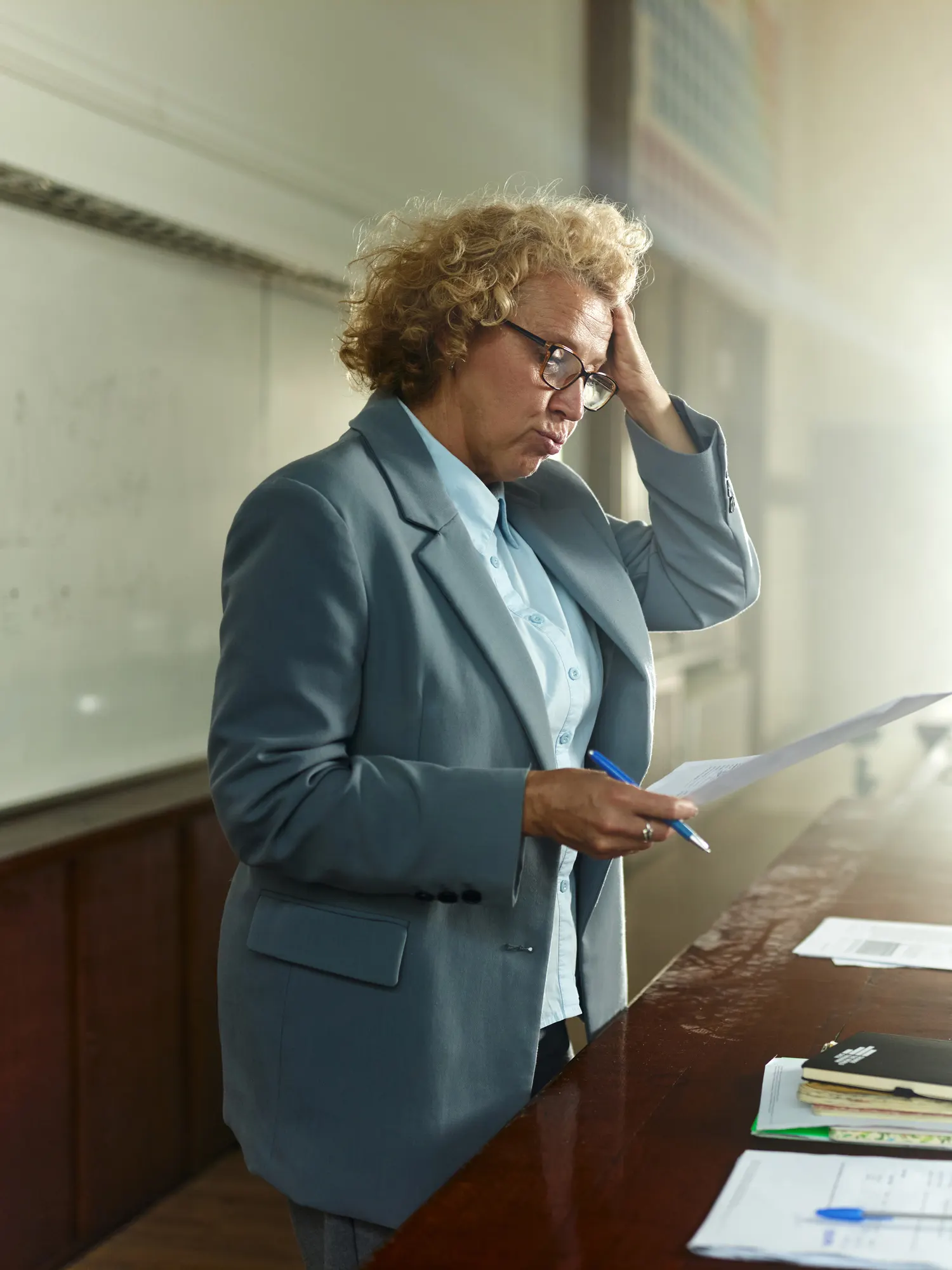 educator-reviewing-test-results-with-concern