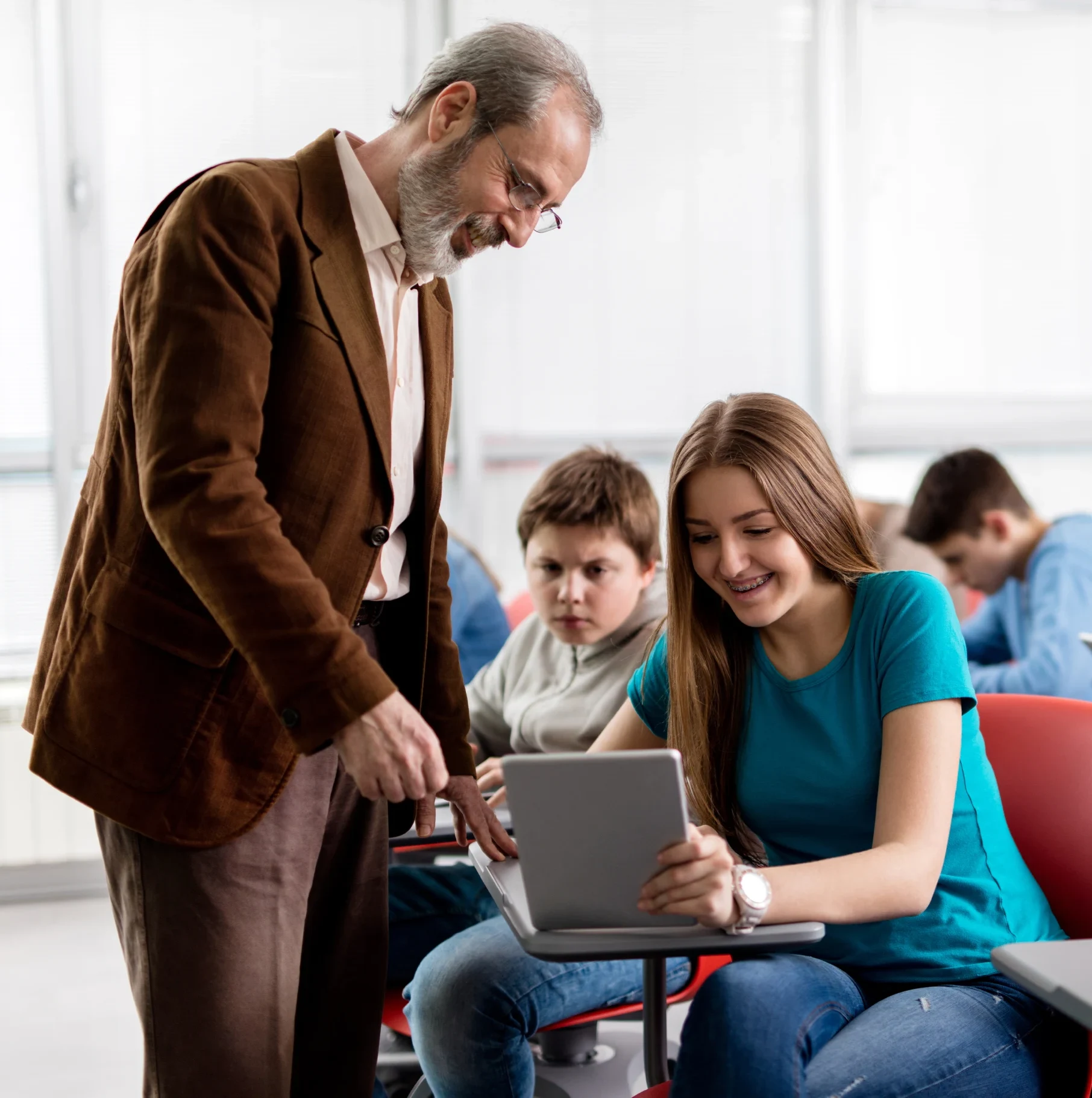 educator-teaching-high-school-children-scaled