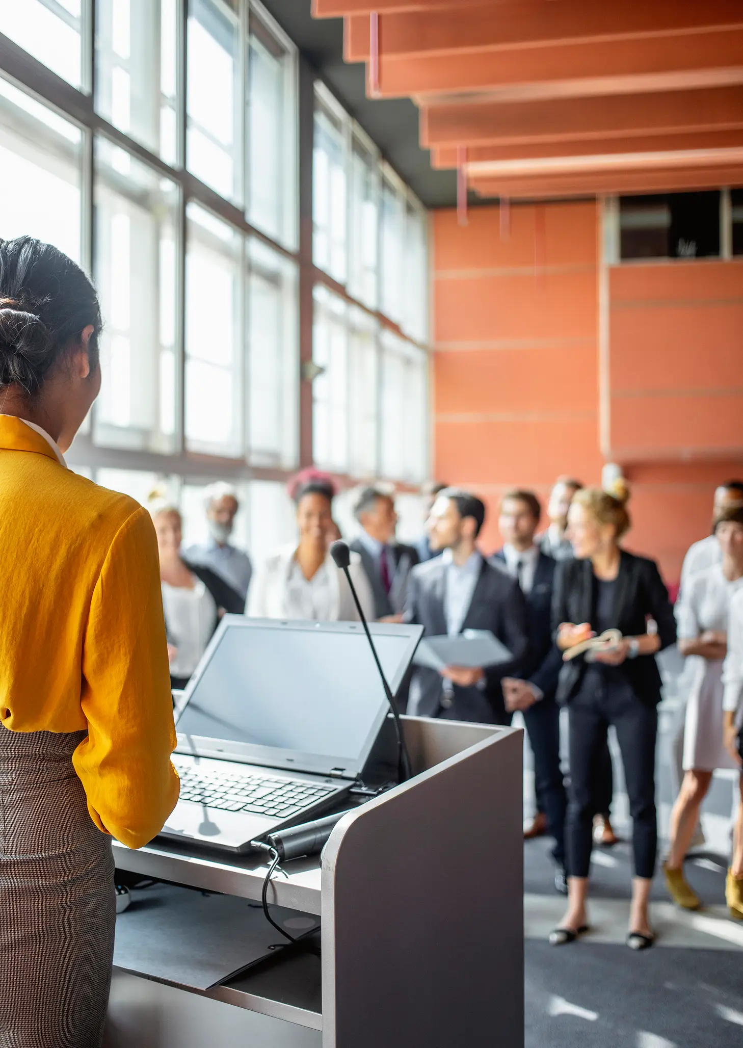 female keynote speaker presenting