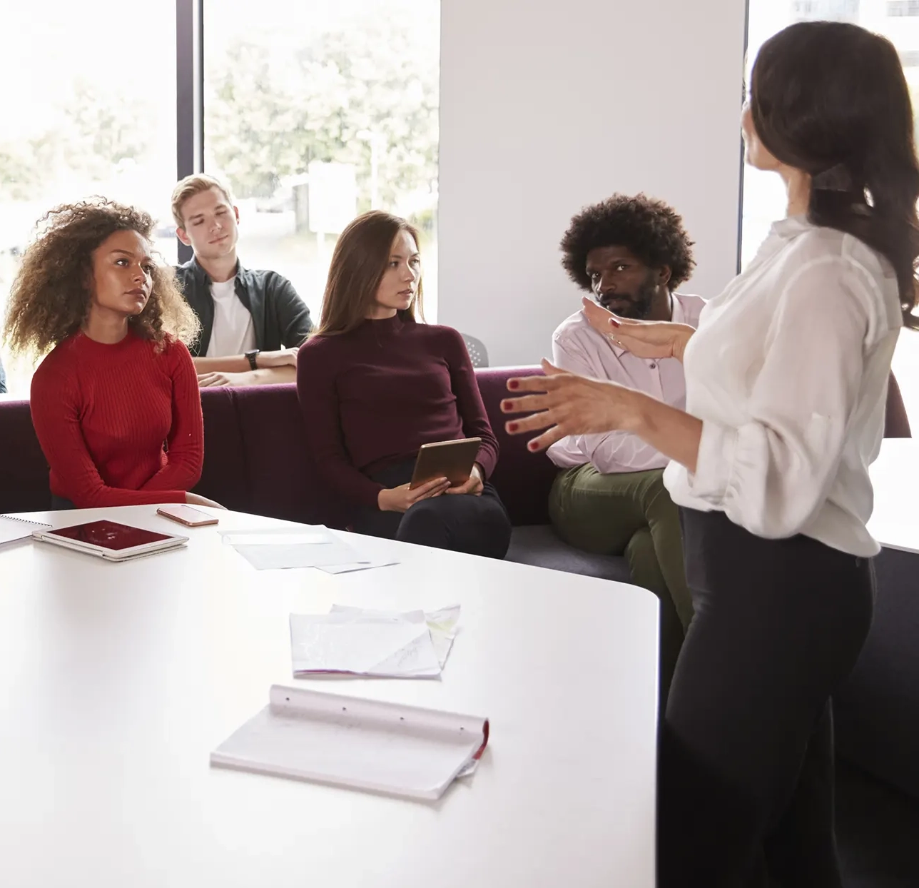 financial-educator-instructor-presenting-students-scaled-1288-1244