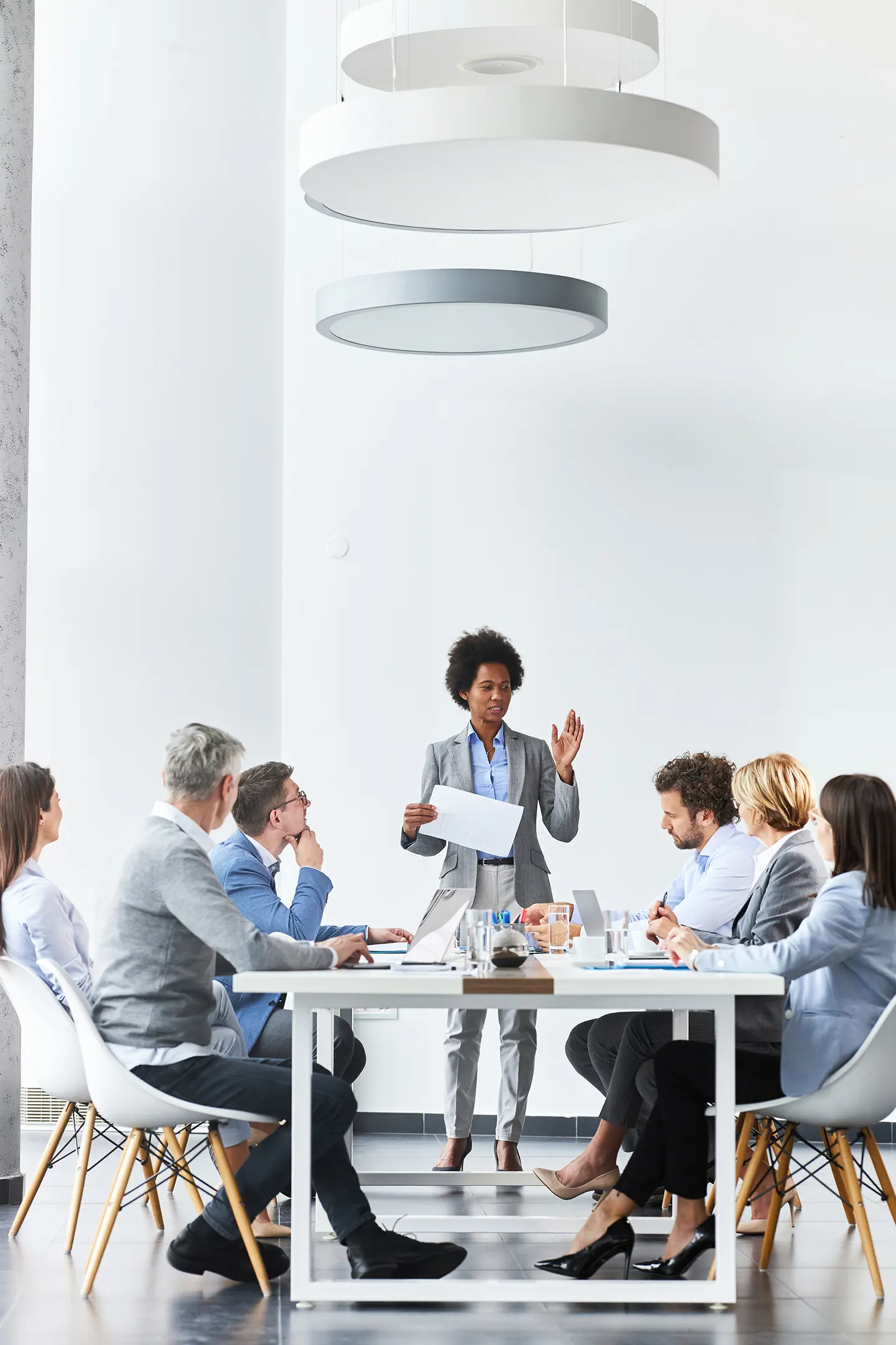 people haviing advocacy meeting around a table