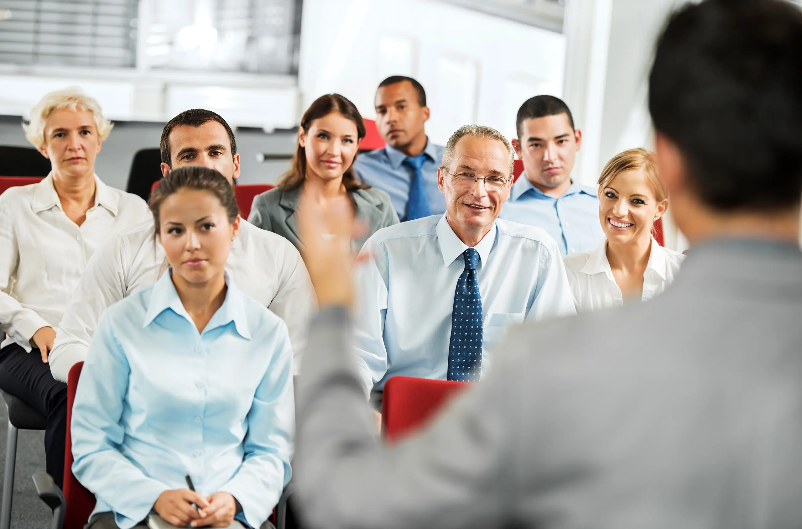 presenter leading curriculum discussion to people