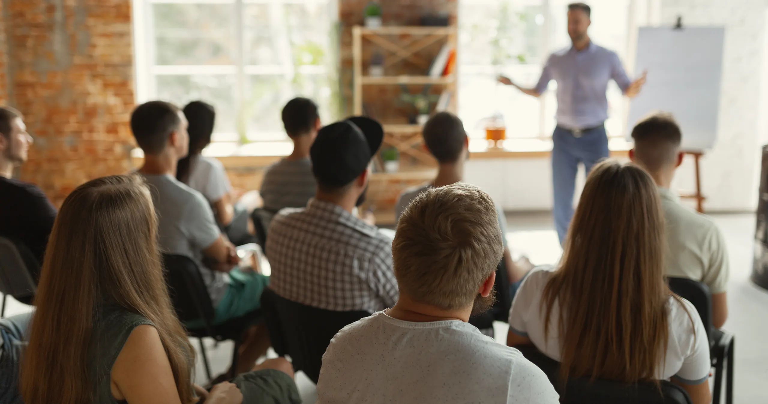 professional educator presenting adult learners in a workshop