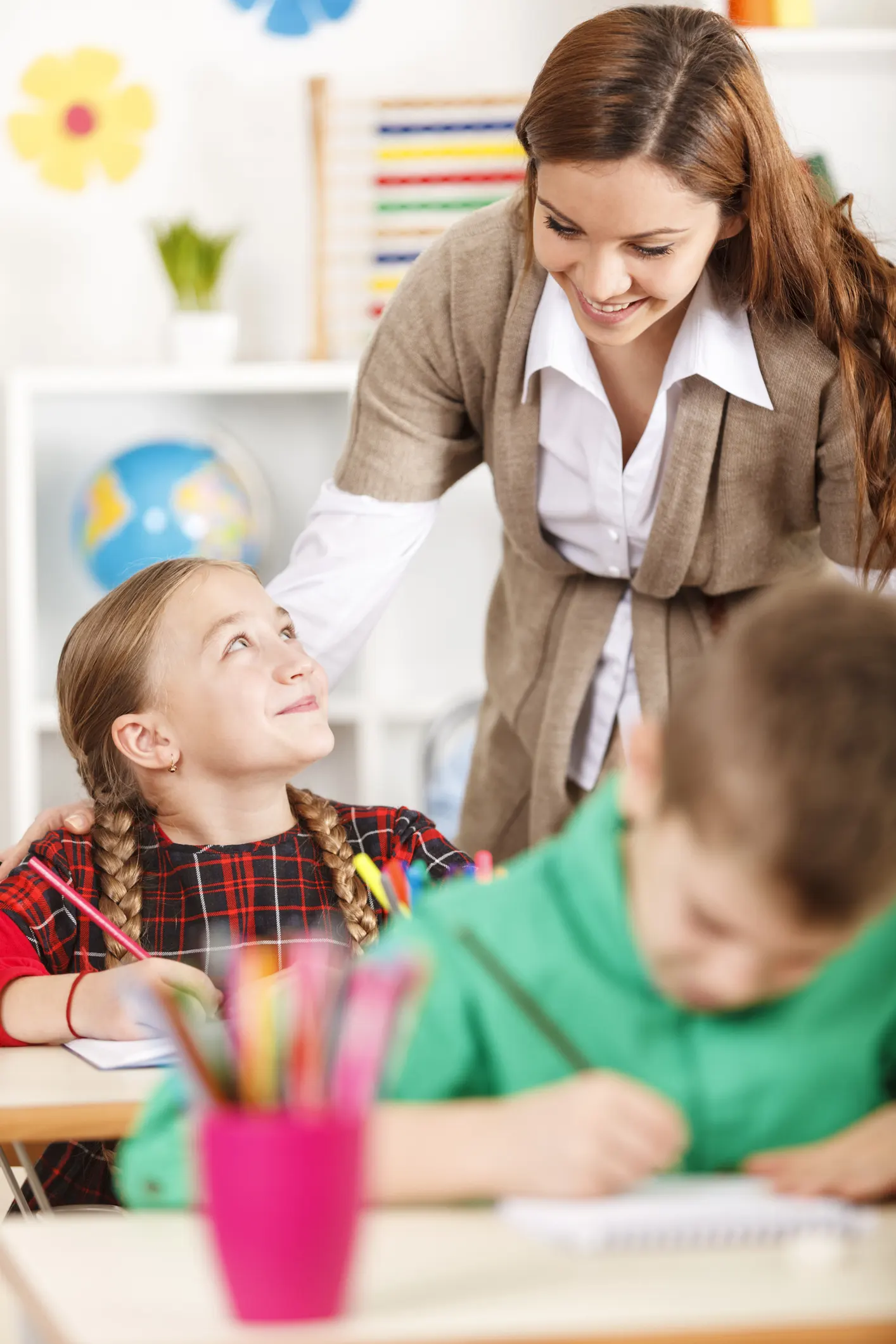 teacher-teaching-some-happy-kids